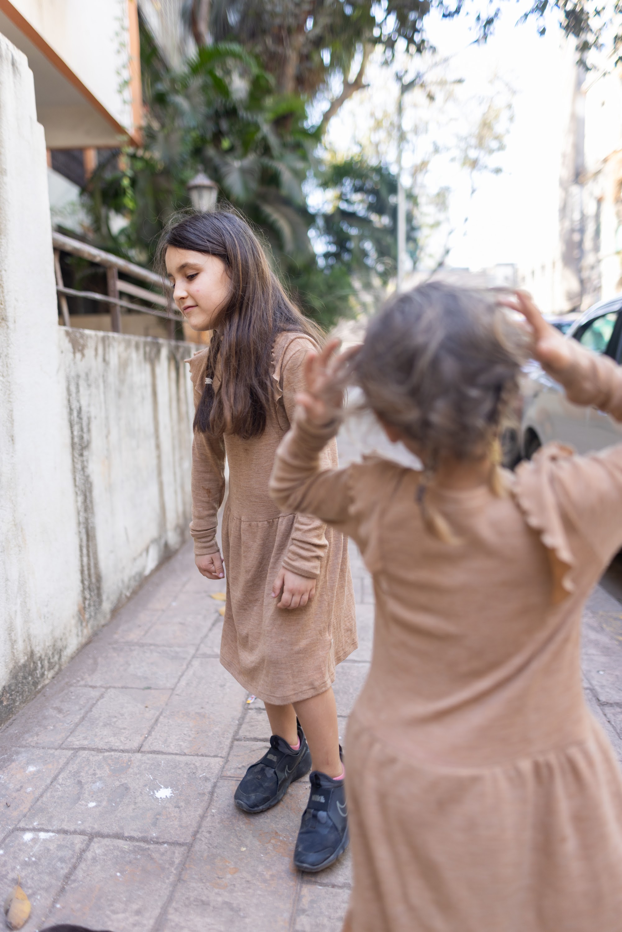 Two Girls Playing Outdoors