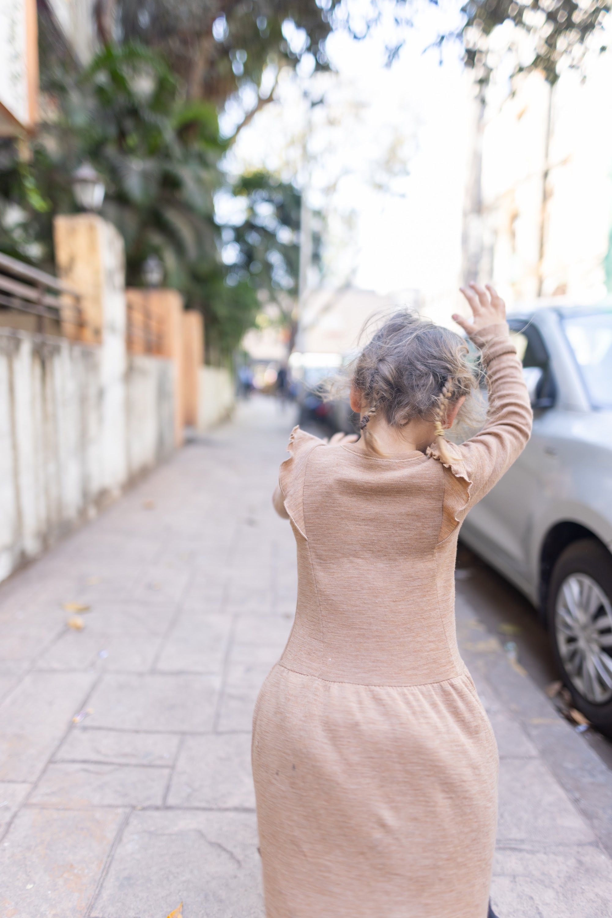 Child Walking Down Street