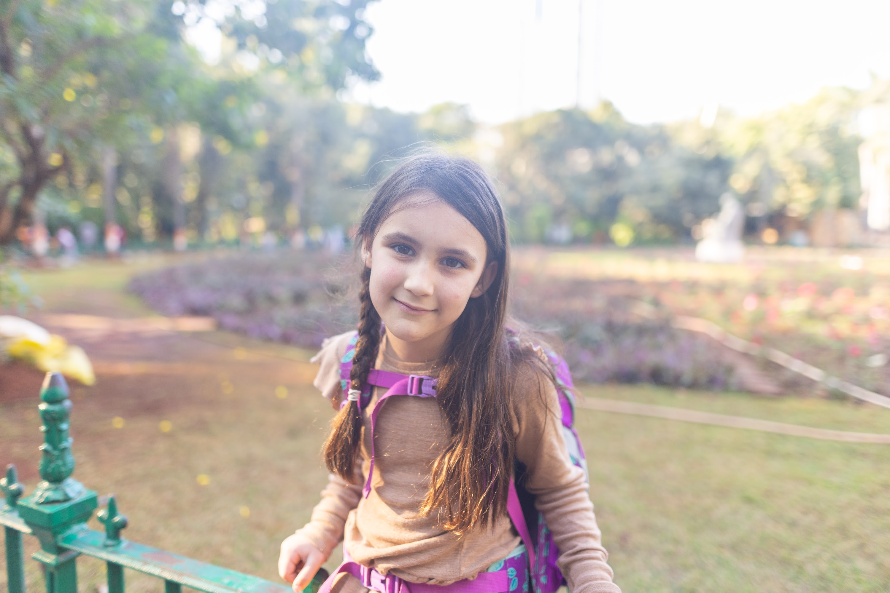 Young Girl Smiling in a Park