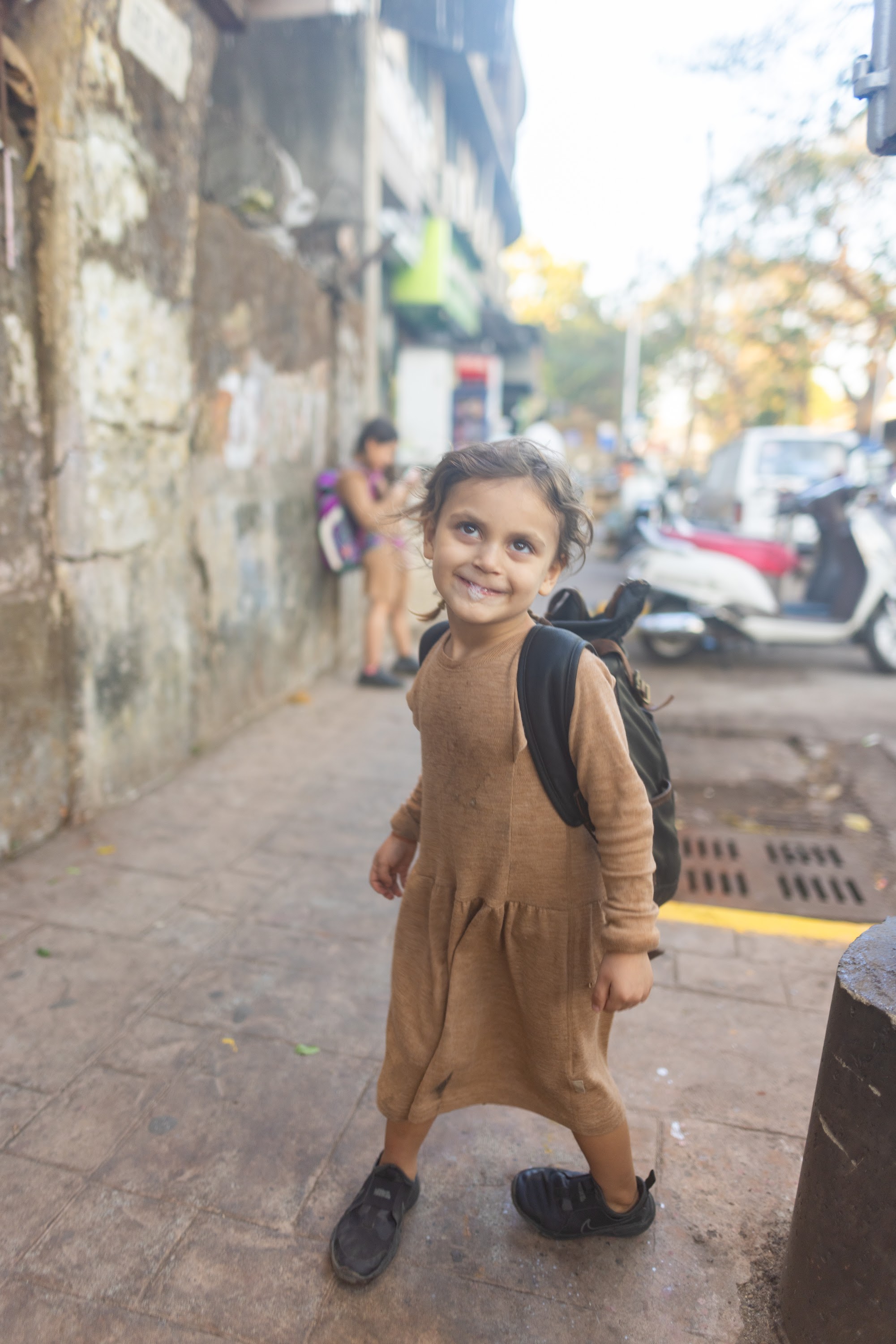 Smiling Girl Walking on Street