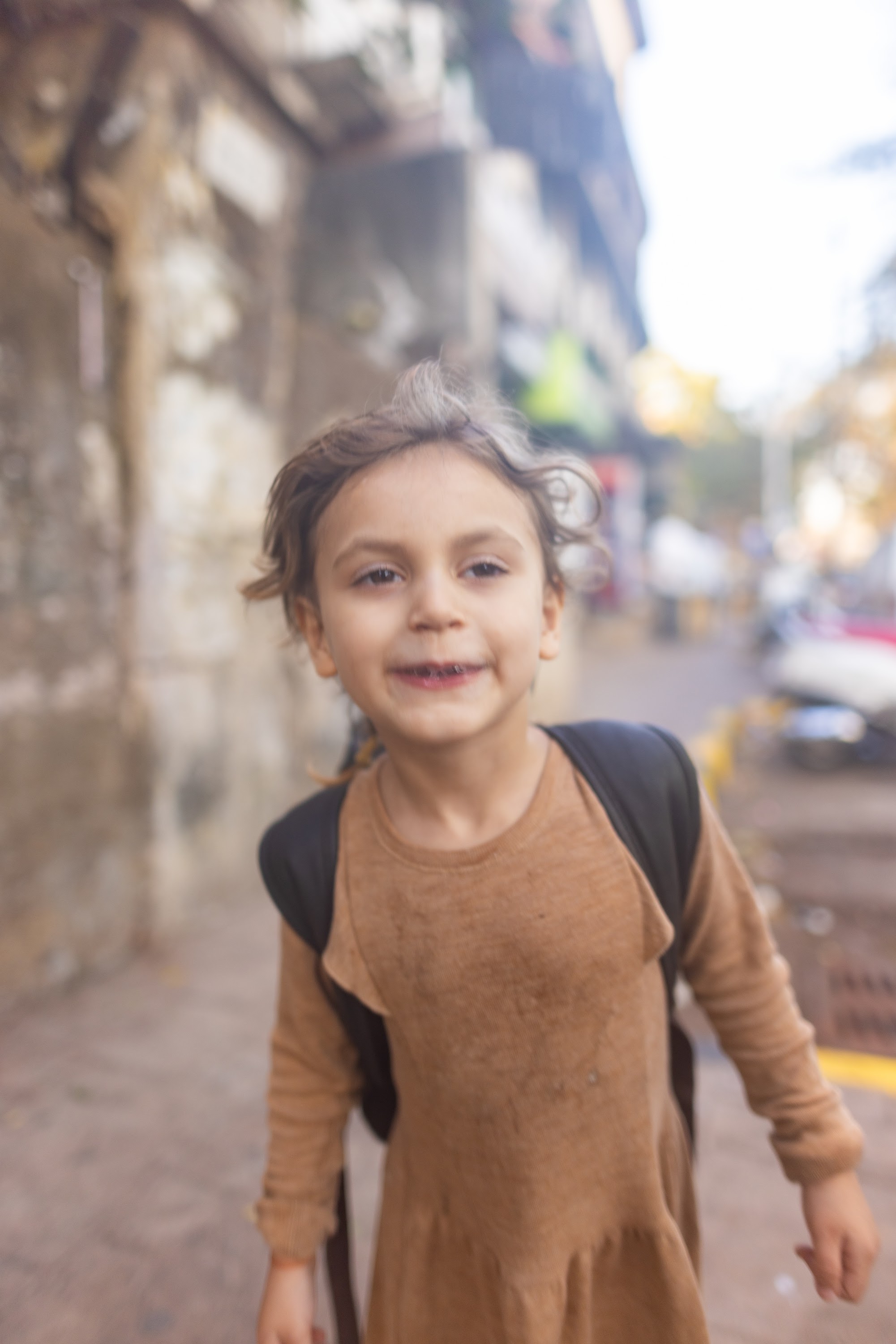 Smiling Child on Street