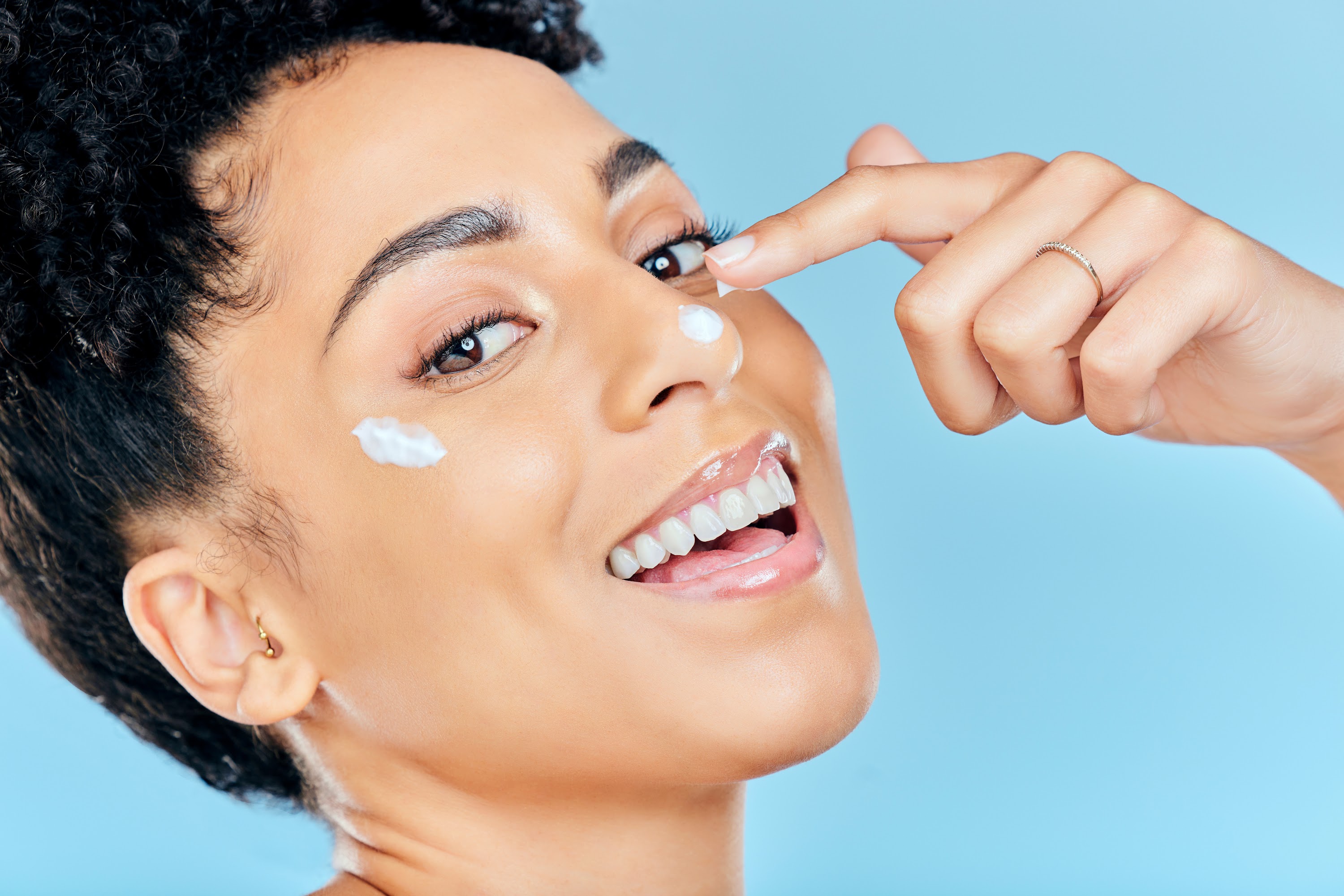 beauty-skincare-portrait-and-happy-woman-with-cre-2023-11-27-05-34-31-utc.jpg