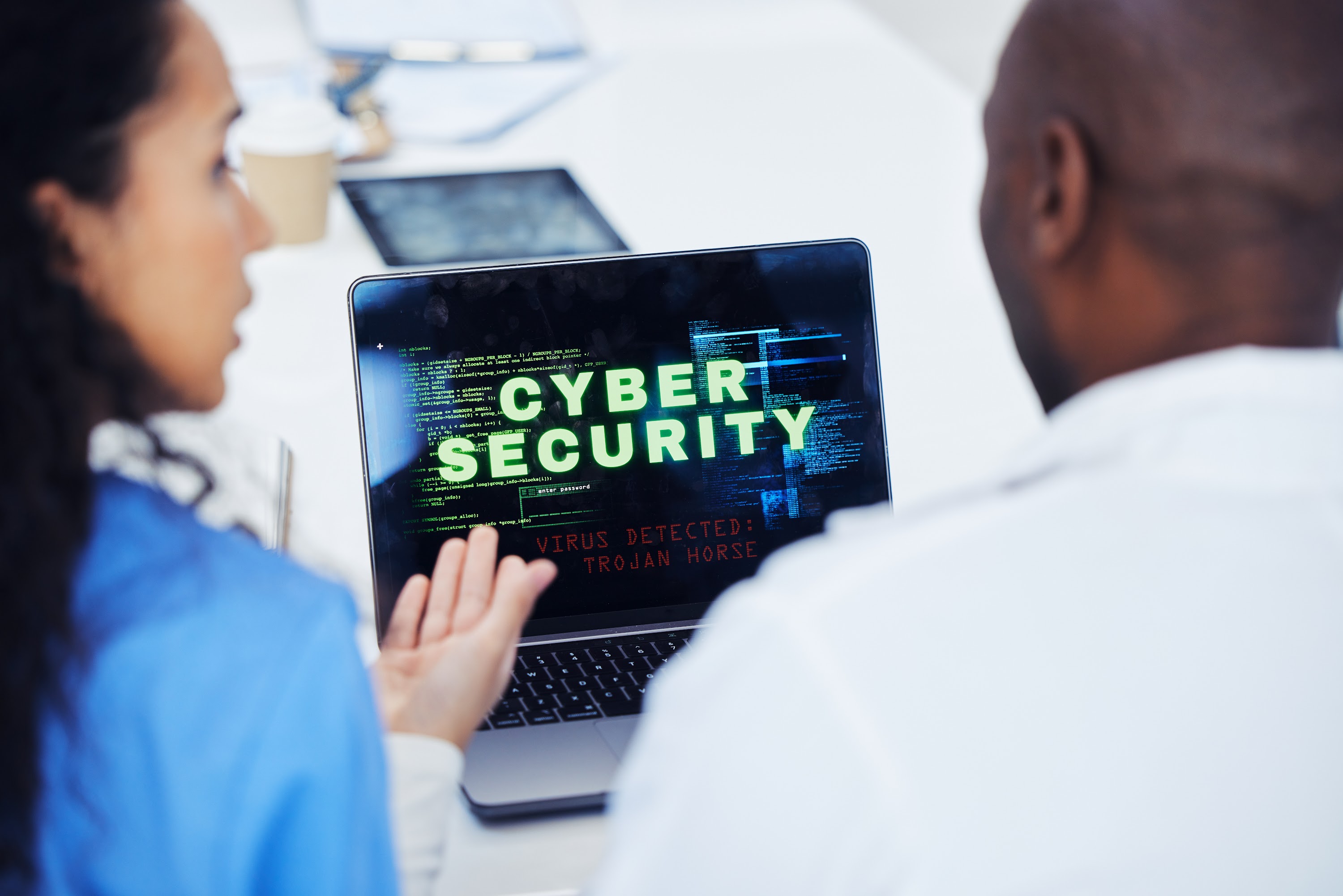 cyber-security-laptop-and-hospital-nurse-doctors-2023-11-27-04-55-36-utc.jpg