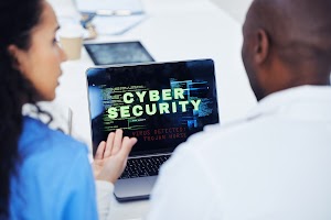 cyber-security-laptop-and-hospital-nurse-doctors-2023-11-27-04-55-36-utc.jpg