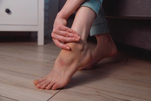 woman-apply-ointment-on-ankle-with-bruise-and-swel-2023-11-27-05-30-52-utc.jpg