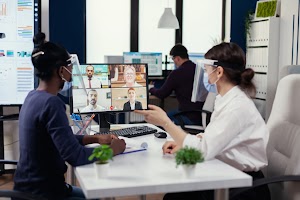 black-woman-and-coworker-having-a-financial-video-2023-11-27-05-05-48-utc.JPG