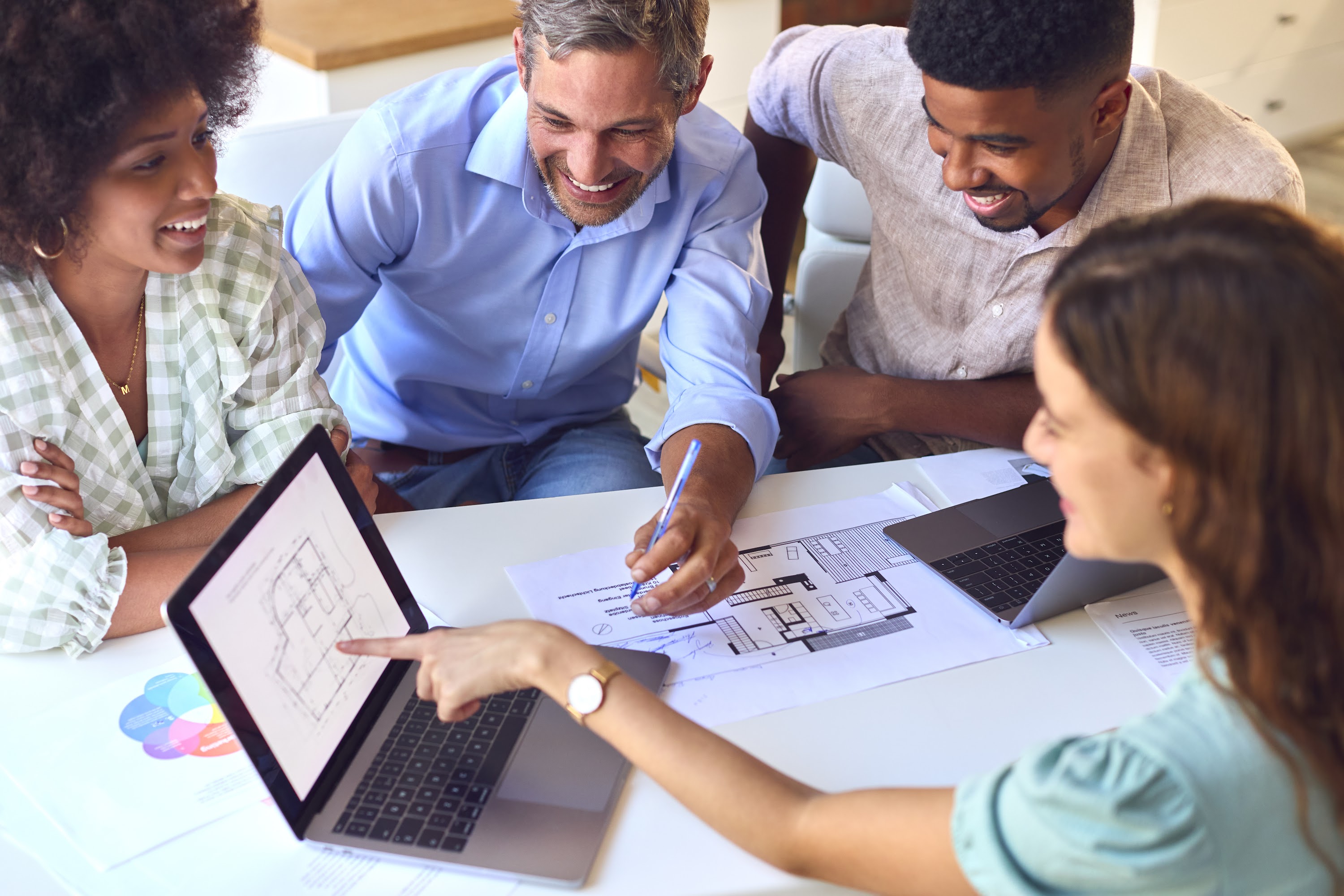 male-and-female-architects-with-laptop-meeting-and-2023-11-27-05-18-22-utc.jpg