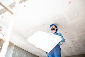workman-warming-the-building-2023-11-27-05-04-53-utc.jpg