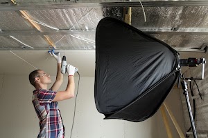 young-man-fixing-drywall-suspended-ceiling-to-meta-2023-11-27-05-30-40-utc.jpg