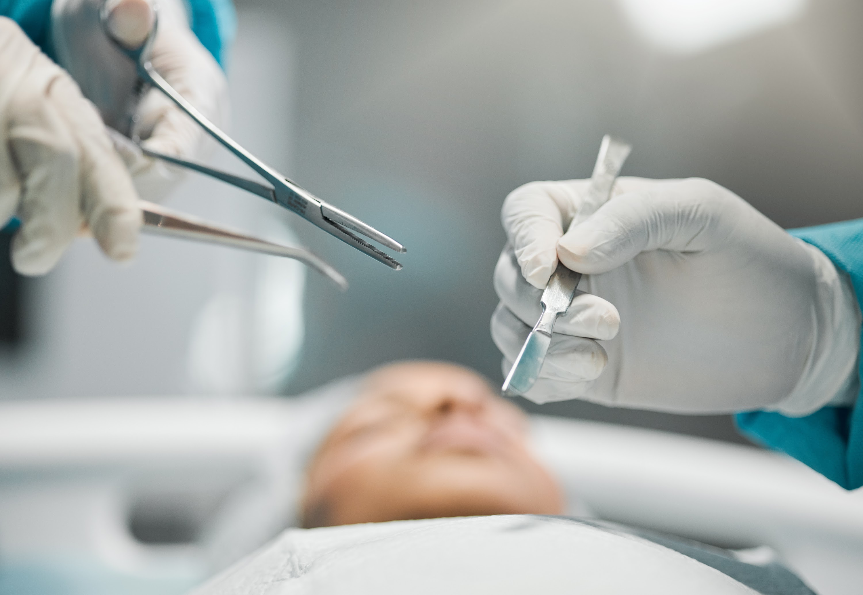 health-care-hands-on-tools-and-doctors-in-surgery-2023-11-27-05-20-35-utc.jpg
