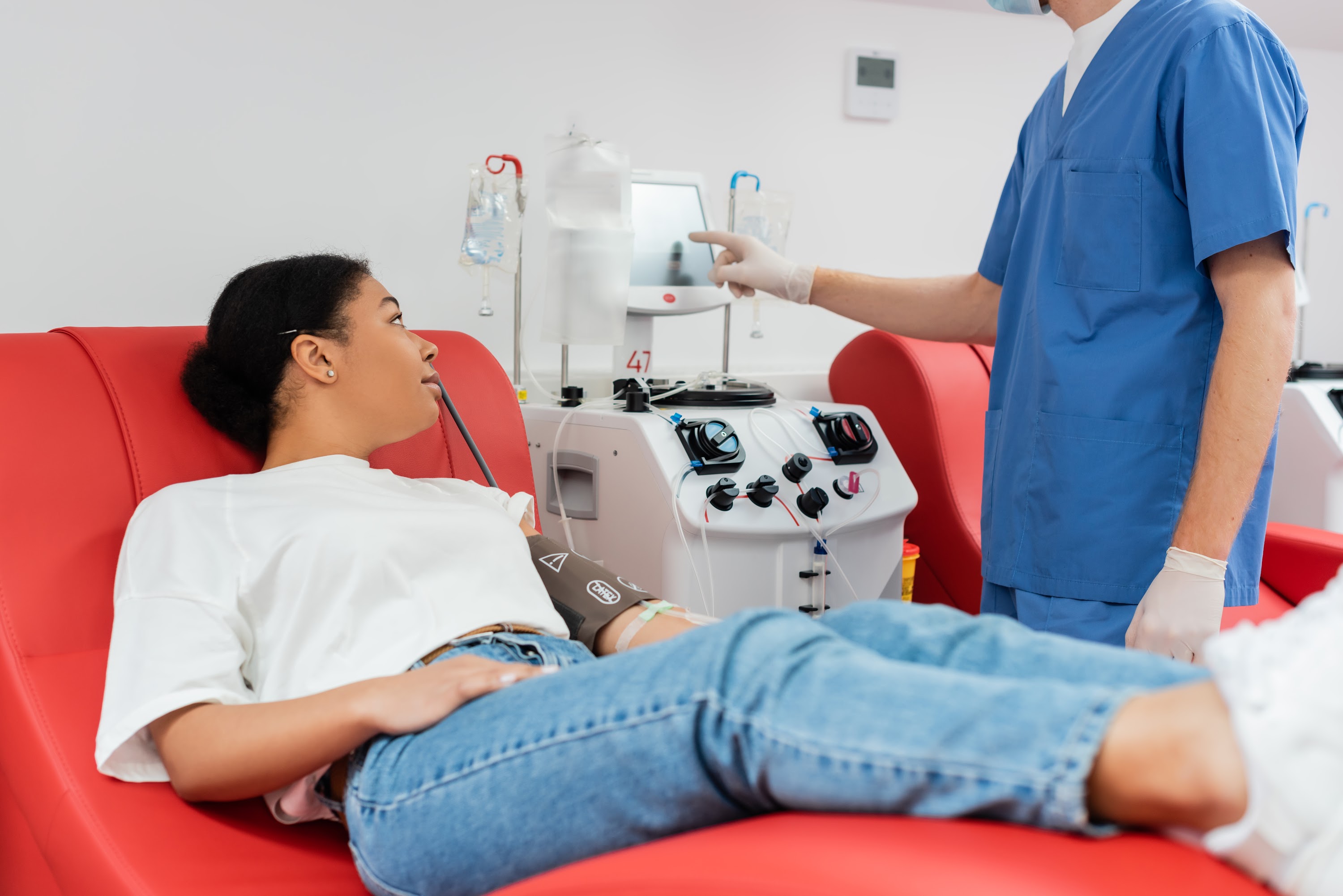healthcare-worker-in-blue-uniform-and-latex-gloves-2023-11-27-04-53-44-utc.jpg
