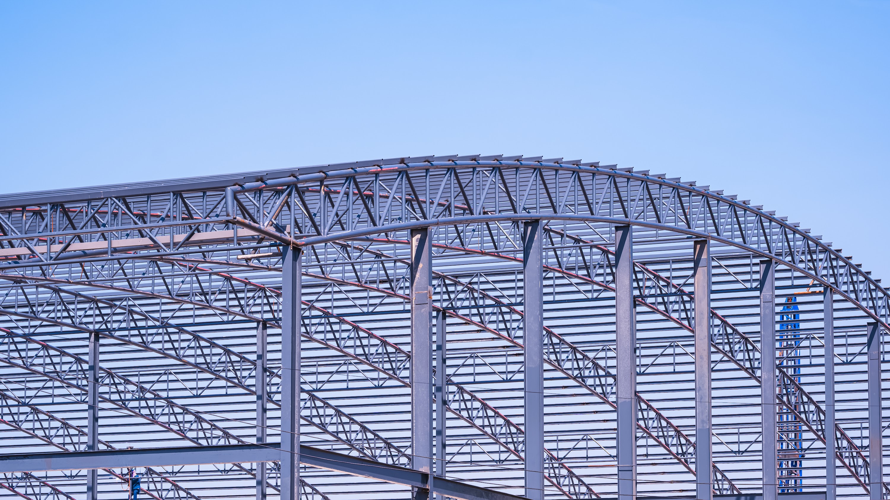 metal-curve-roof-beam-and-columns-outline-of-indus-2023-11-27-05-30-17-utc.jpg