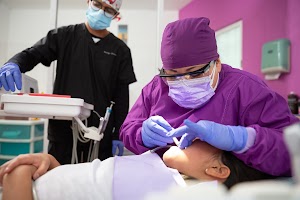 mexican-female-dentist-doing-dental-treatment-on-a-2023-11-27-05-19-35-utc.jpg