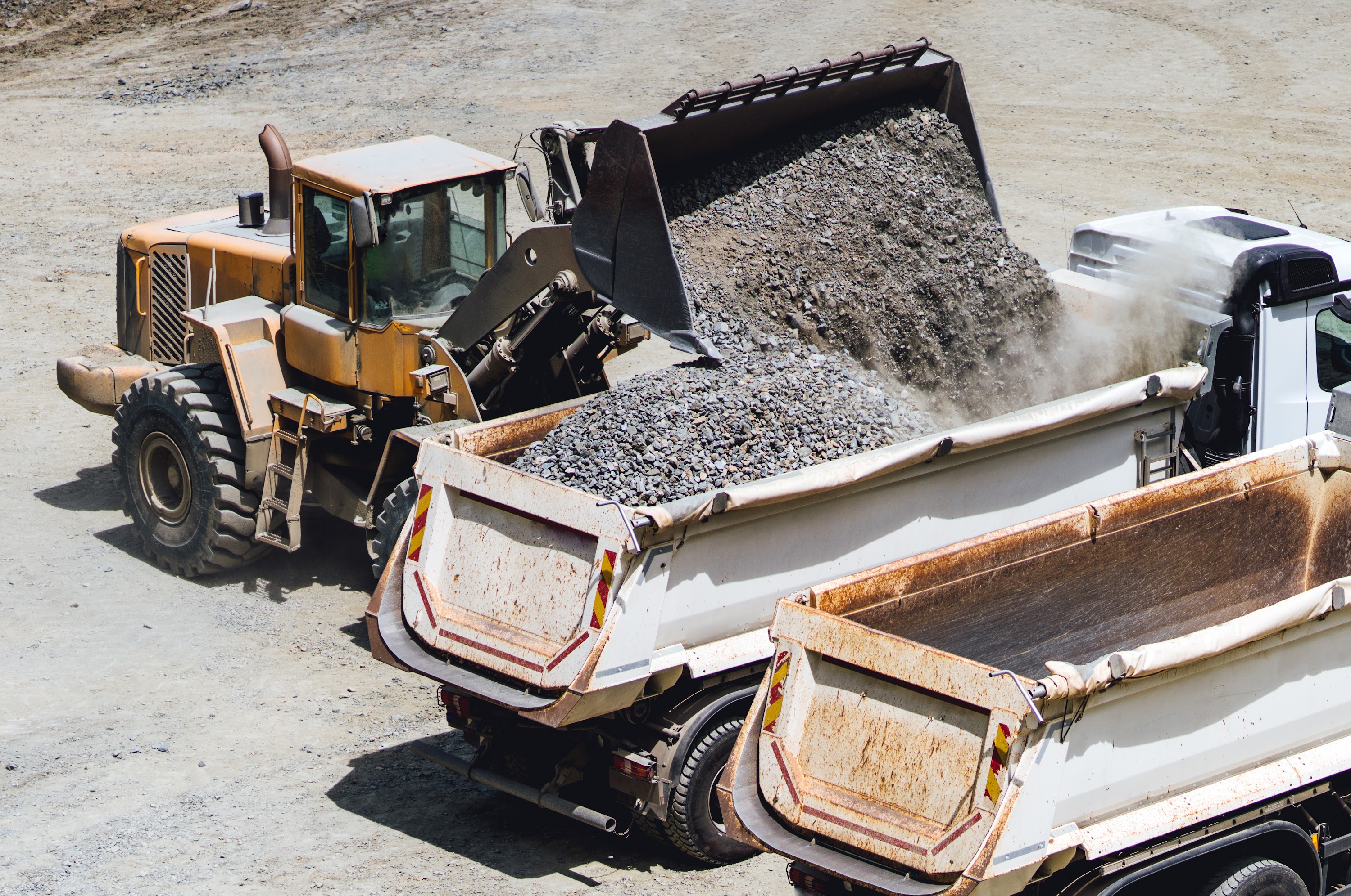 wheel-loader-working-on-construction-site-and-load-2023-11-27-05-28-48-utc.jpg