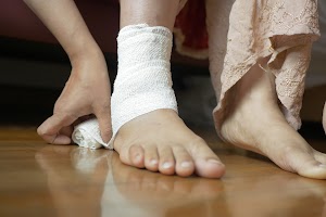woman-with-bandaged-foot-close-up-2023-11-27-05-02-06-utc.jpg