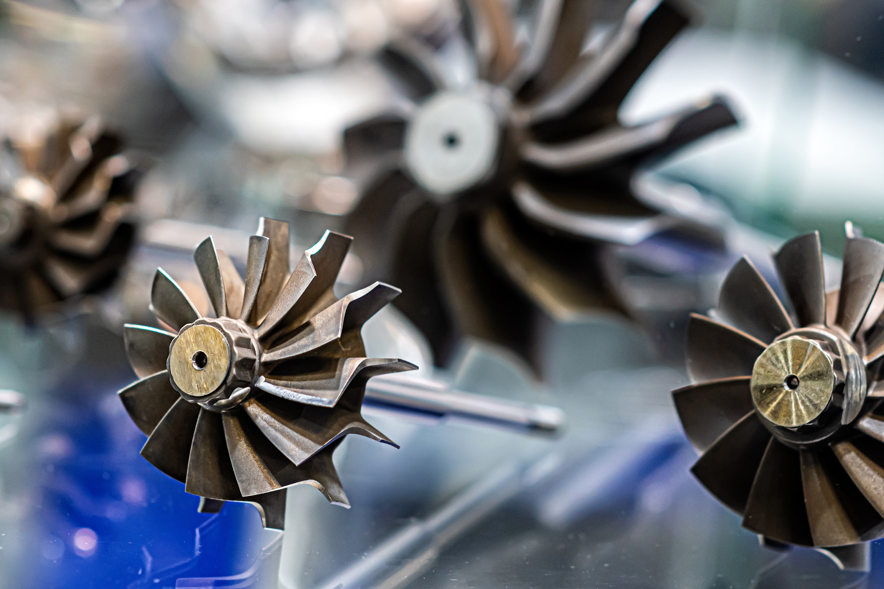 abstract-background-with-car-engine-parts-in-a-gla-2023-11-27-05-11-57-utc.jpg