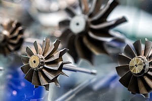 abstract-background-with-car-engine-parts-in-a-gla-2023-11-27-05-11-57-utc.jpg
