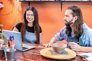 man-and-women-own-pottery-business-use-laptop-and-2023-11-27-05-32-44-utc.jpg