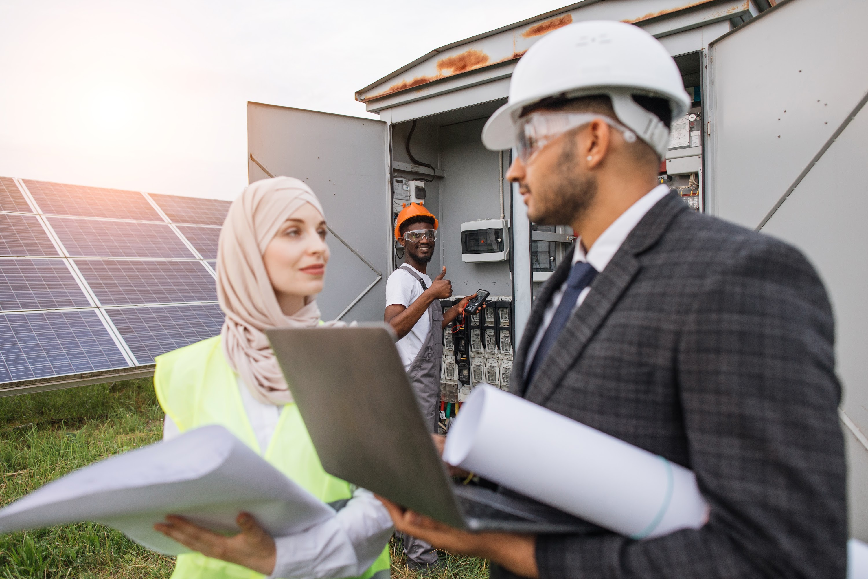 multi-ethnic-people-controlling-work-of-solar-pane-2023-11-27-05-27-43-utc (1).jpg