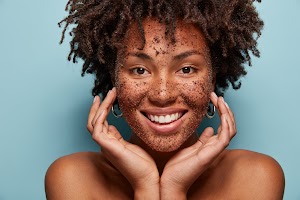 photo-of-smiling-black-woman-has-cleansing-mask-or-2023-11-27-05-17-14-utc.jpg