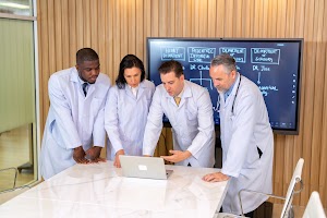 a-group-of-doctors-looks-at-laptop-computer-brains-2024-10-17-12-20-33-utc.jpg