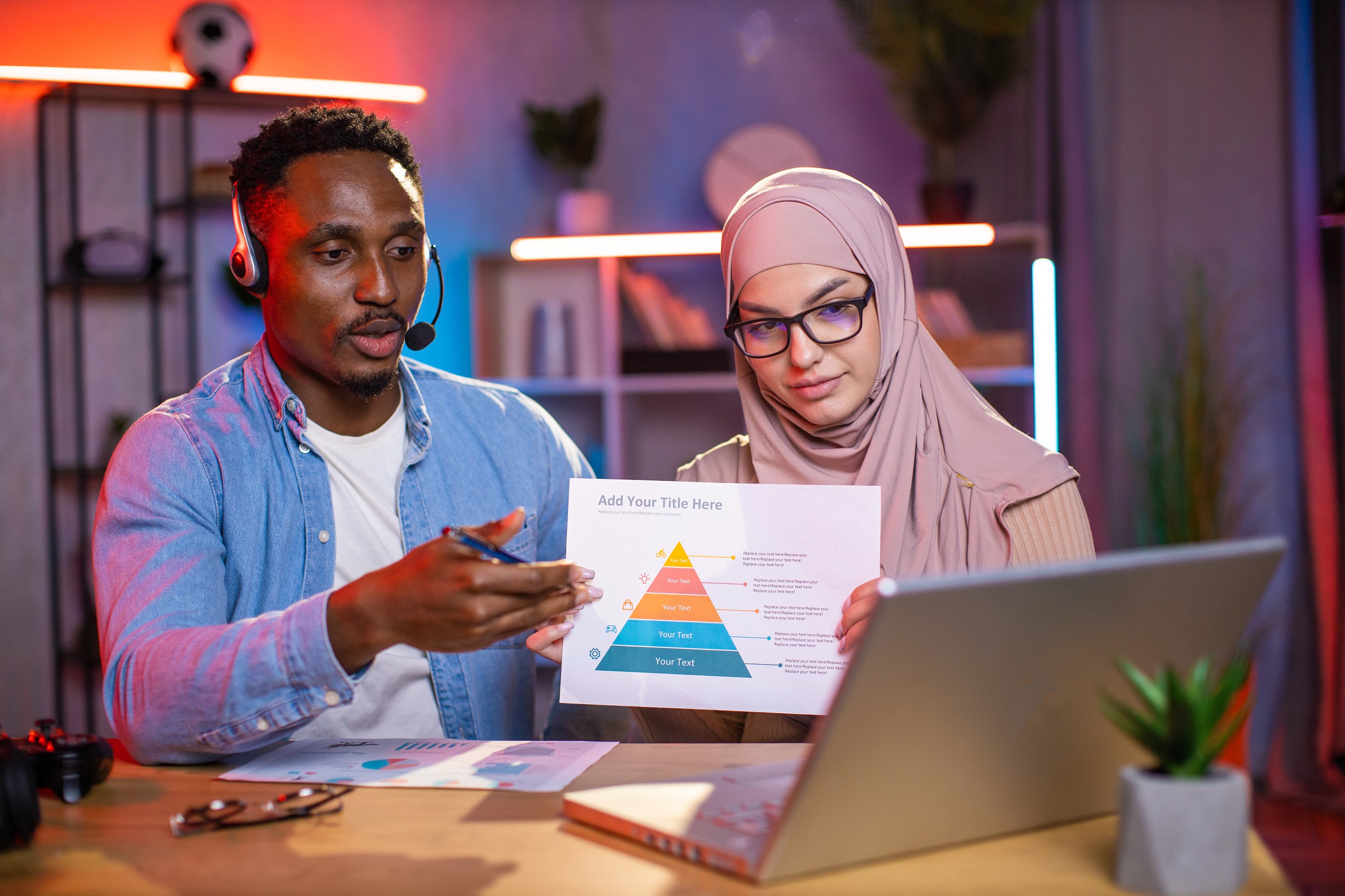 black-man-and-arabian-woman-using-laptoptop-for-vi-2023-11-27-04-49-37-utc.jpg
