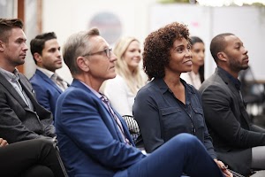 group-of-businessmen-and-businesswomen-listening-t-2024-10-21-09-19-49-utc.jpg