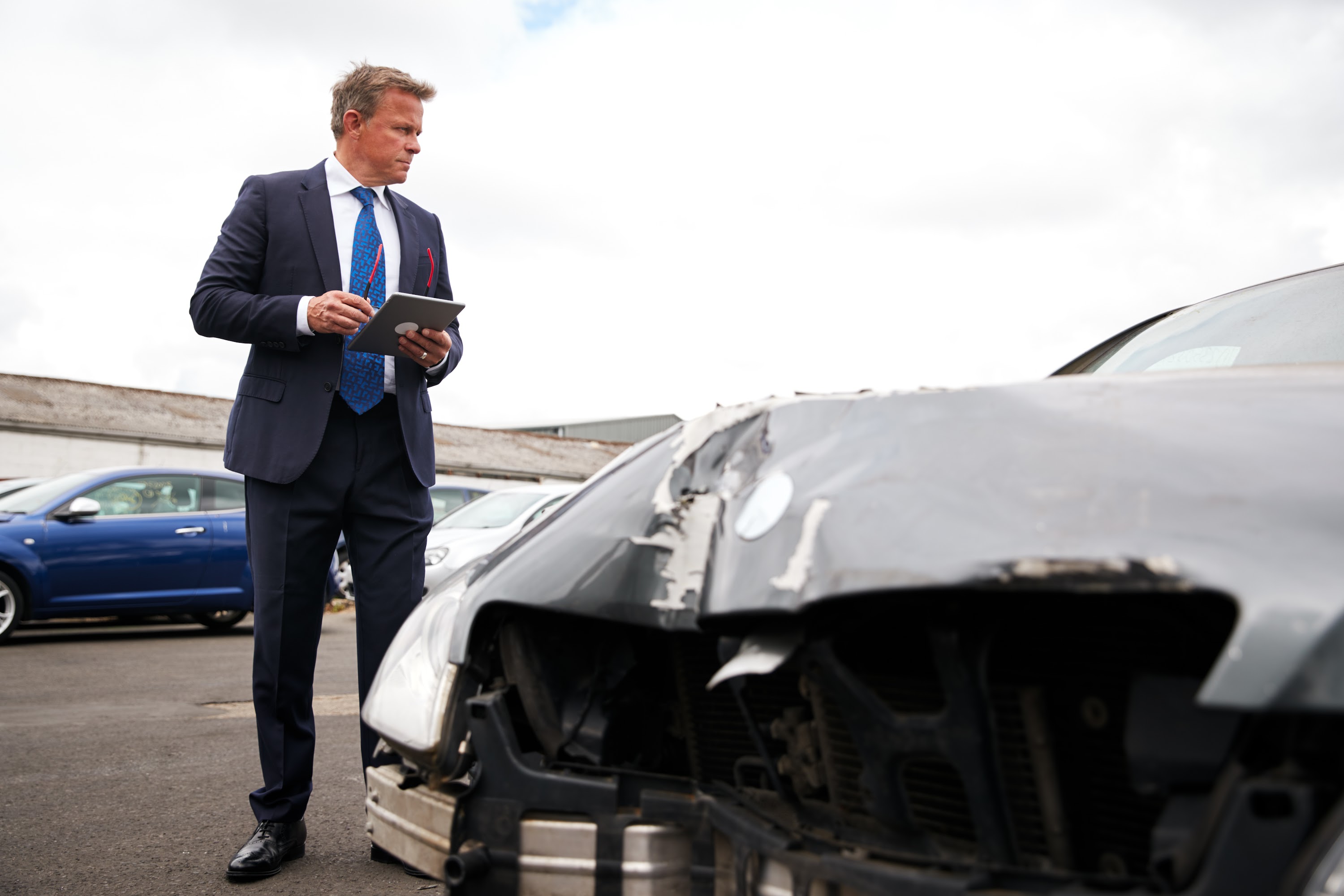 male-insurance-loss-adjuster-with-digital-tablet-i-2024-10-19-03-19-53-utc.jpg