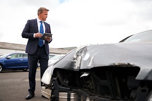 male-insurance-loss-adjuster-with-digital-tablet-i-2024-10-19-03-19-53-utc.jpg