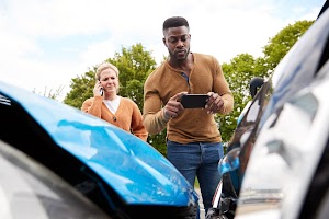 male-motorist-involved-in-car-accident-taking-pict-2024-10-19-04-32-08-utc.jpg