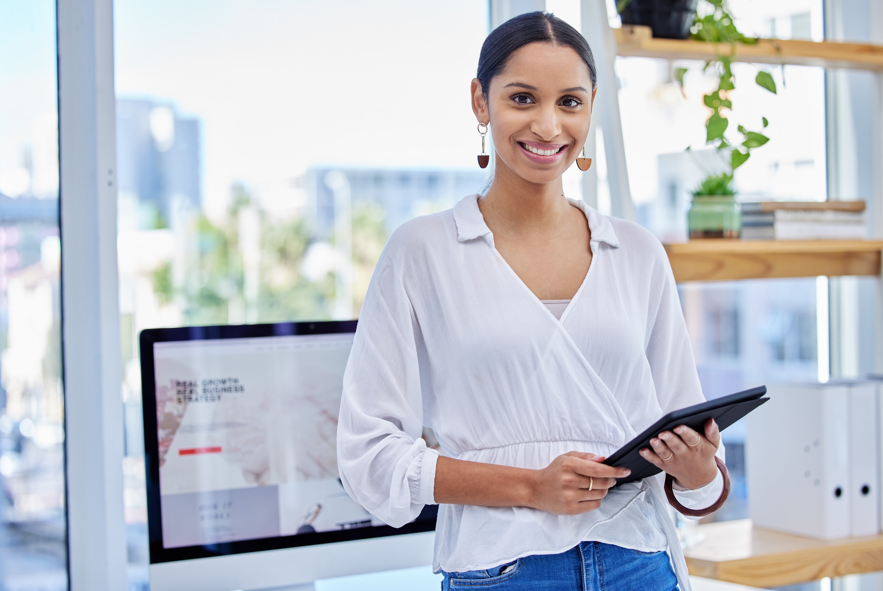shot-of-a-businesswoman-using-a-digital-tablet-in-2023-11-27-05-05-40-utc.jpg