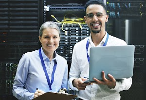 teamwork-makes-technology-work-shot-of-two-techni-2023-11-27-05-33-29-utc.jpg