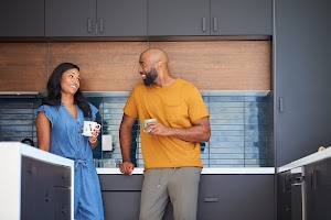 african-american-couple-talking-and-drinking-coffe-2024-10-19-08-26-12-utc.jpg