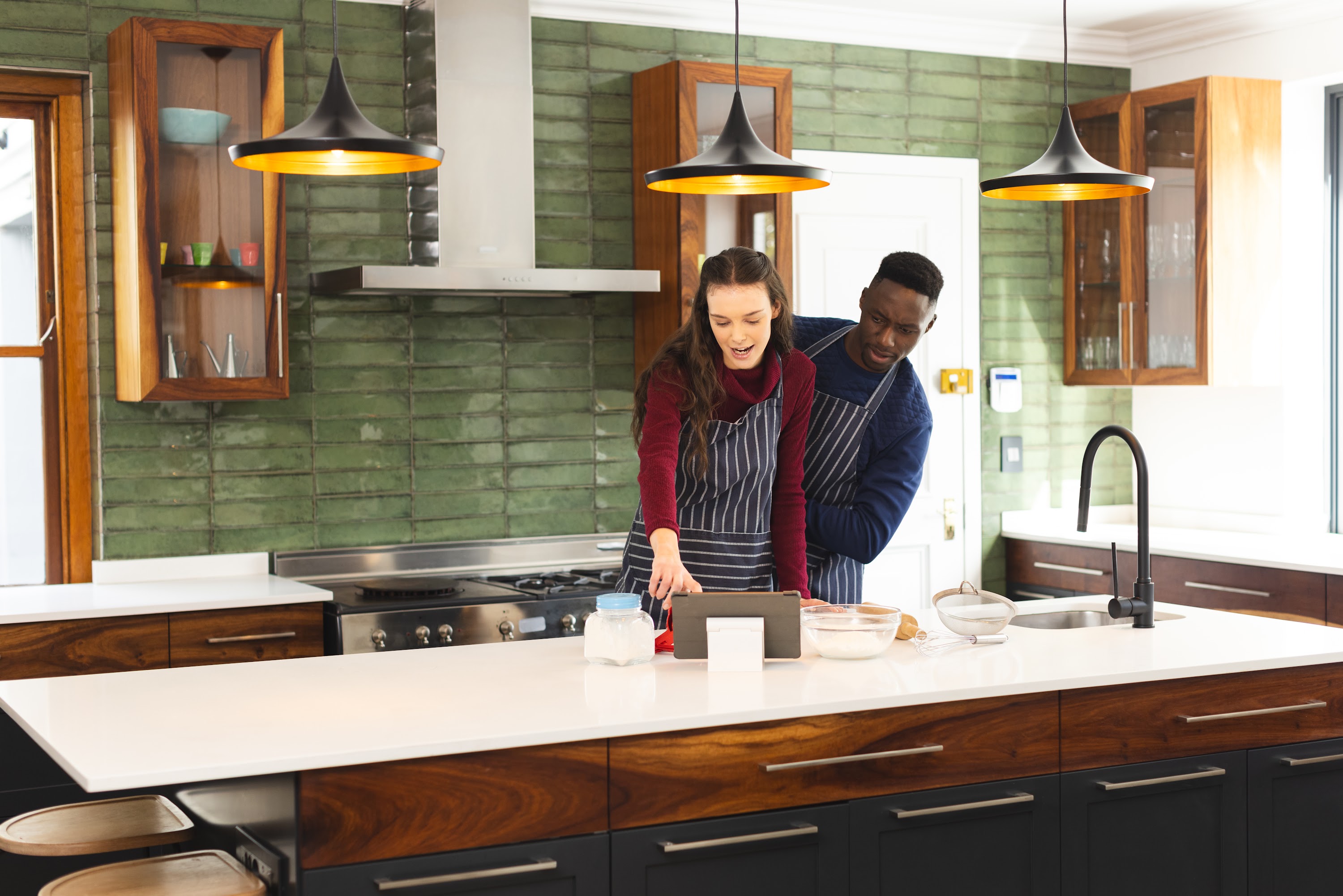 happy-diverse-couple-baking-together-in-kitchen-u-2023-11-27-05-15-04-utc.jpg
