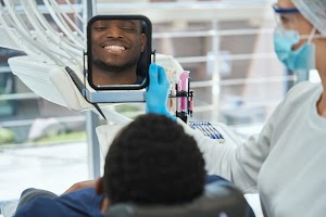 patient-looking-at-result-after-dental-treatment-i-2024-10-19-18-48-23-utc.jpg
