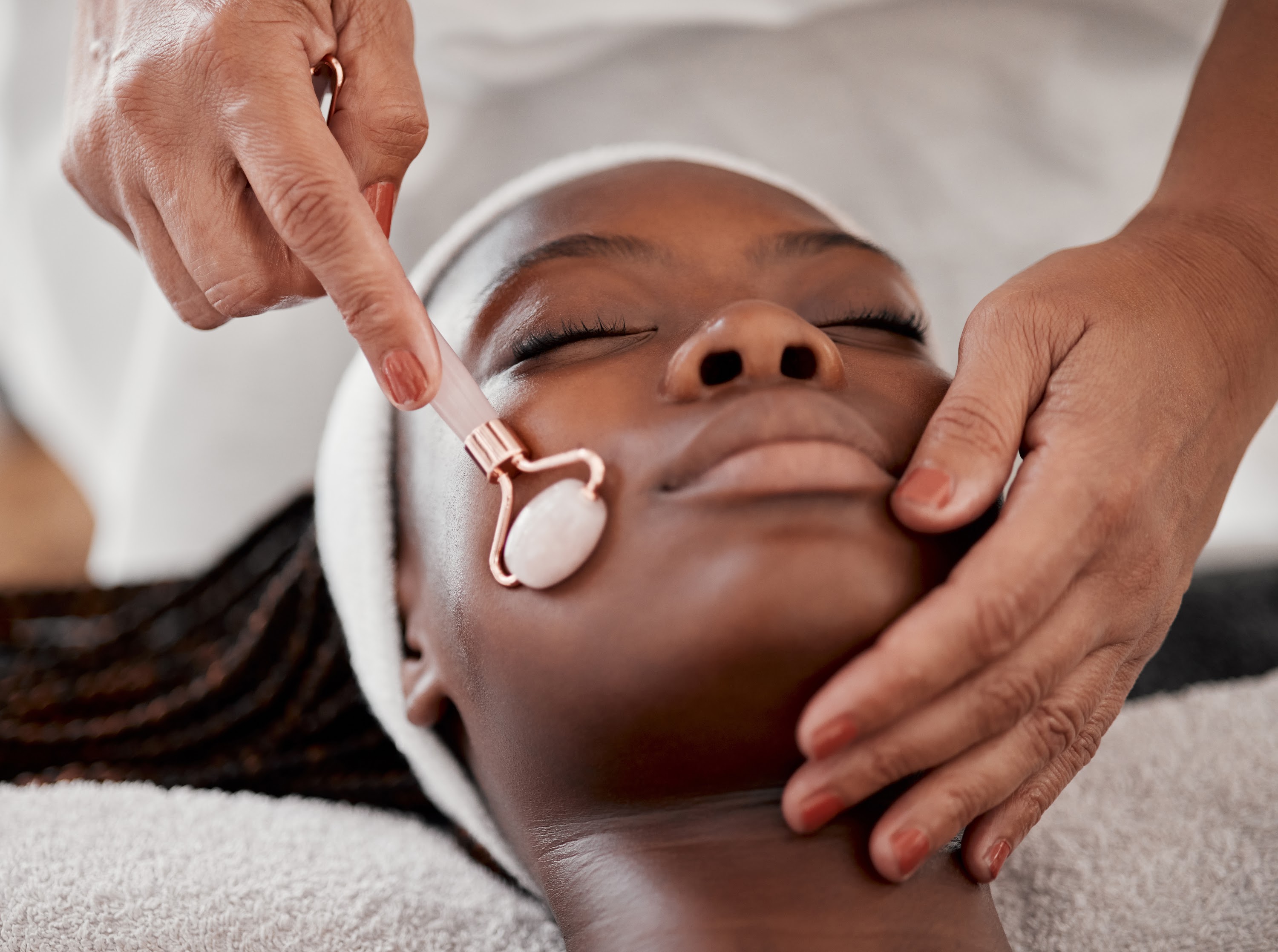 facial-roller-spa-and-black-woman-relax-for-massa-2023-11-27-05-11-29-utc.jpg