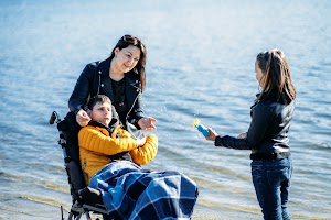 happy-family-mother-daughter-and-son-with-cerebr-2023-11-27-05-19-50-utc.jpg