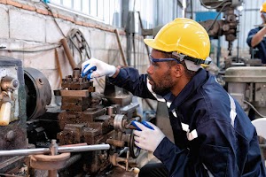 in-robotic-maintenance-repair-engineer-lathe-machi-2024-10-18-06-42-59-utc.jpg