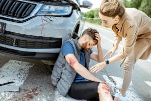 woman-driver-with-injured-man-on-the-road-2023-11-27-04-57-46-utc.jpg