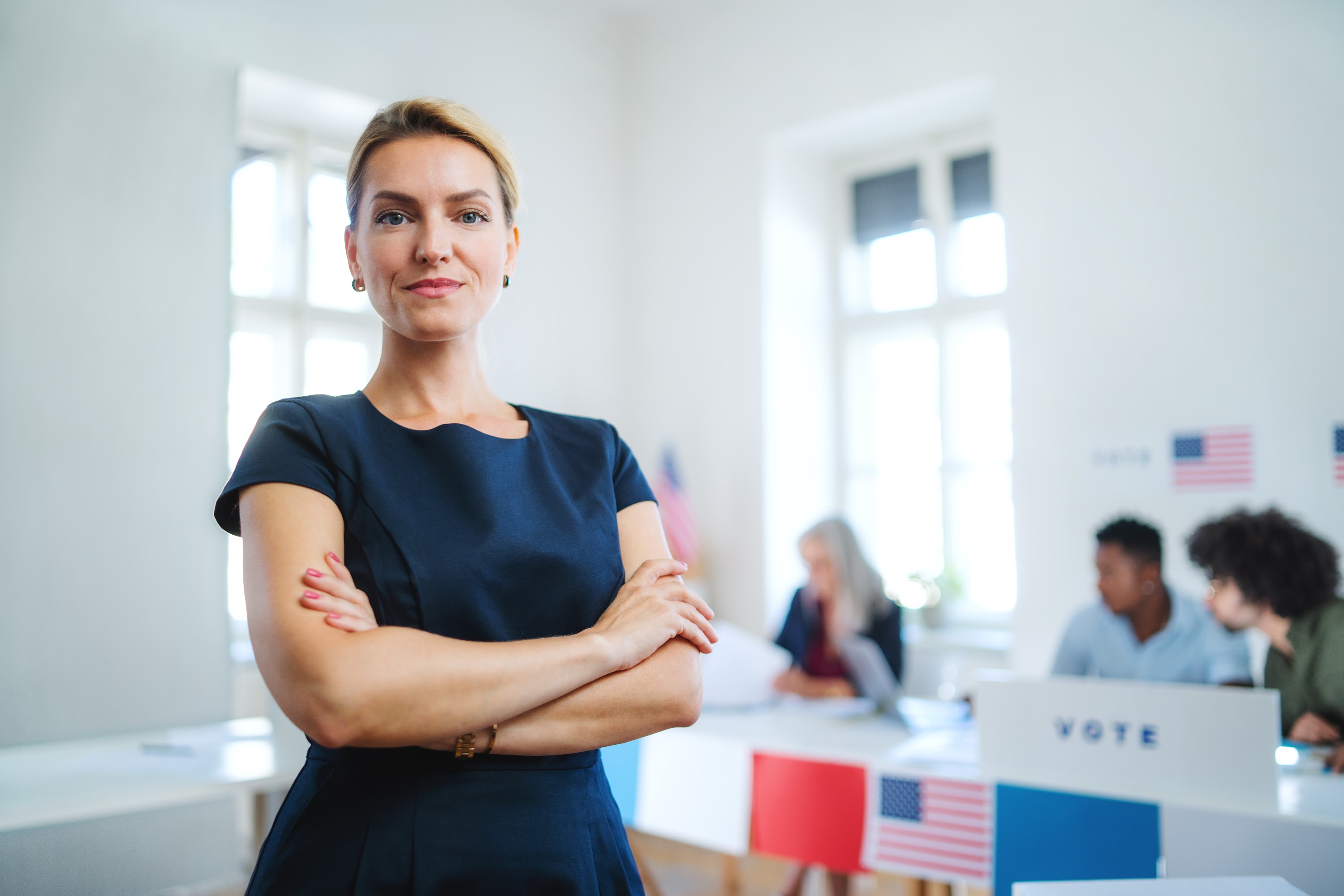 portrait-of-confident-woman-voter-in-polling-place-2024-10-18-09-02-27-utc.jpg