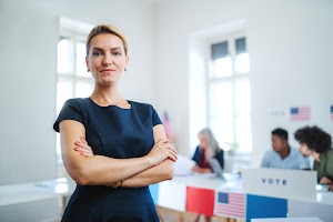 portrait-of-confident-woman-voter-in-polling-place-2024-10-18-09-02-27-utc.jpg
