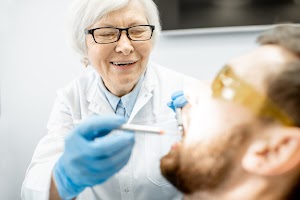 elderly-woman-dentist-durnig-the-medical-procedure-2023-11-27-05-05-20-utc.jpg