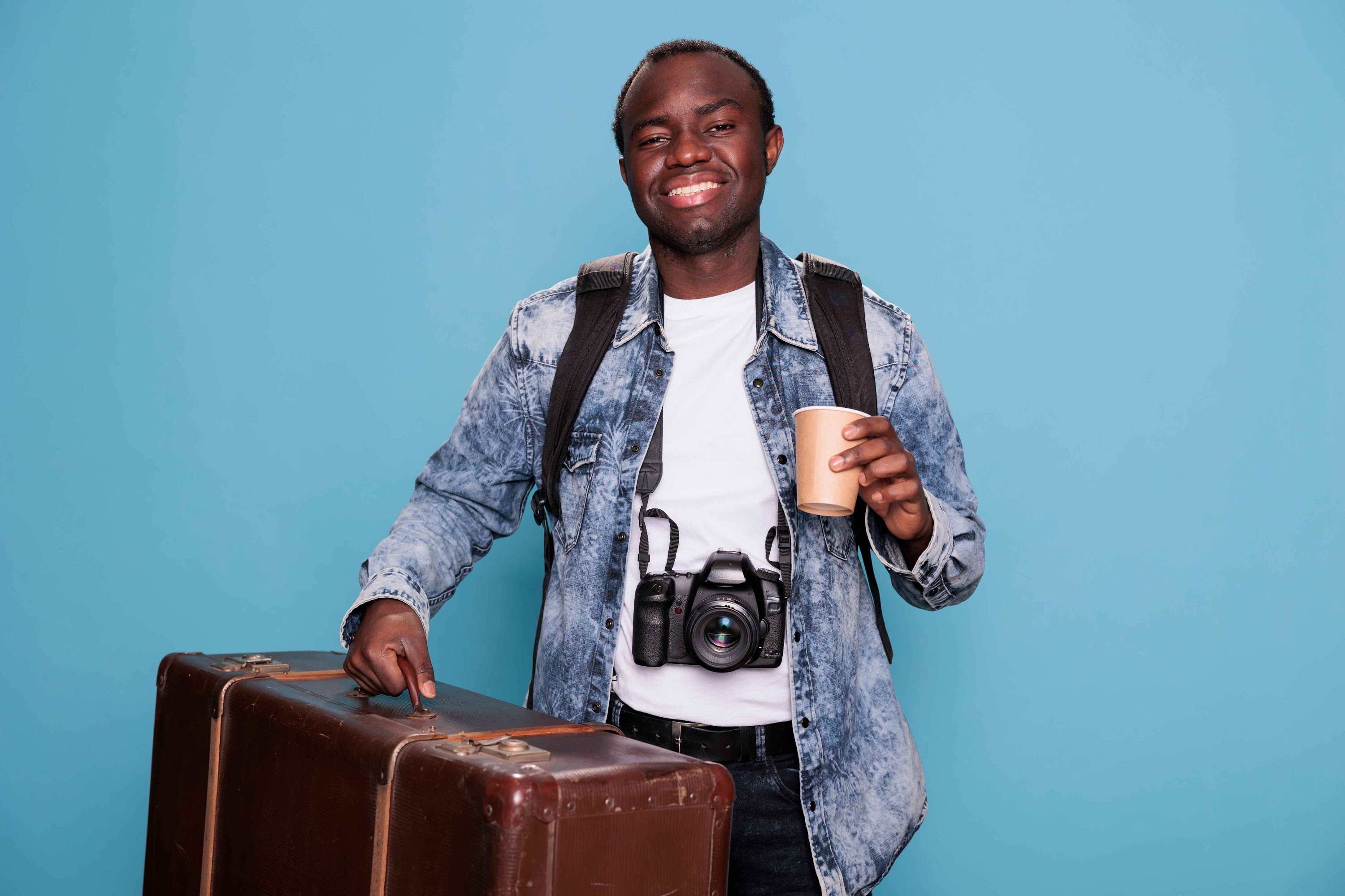 happy-photographer-having-luggage-and-dslr-camera-2023-11-27-04-50-12-utc (1).jpg