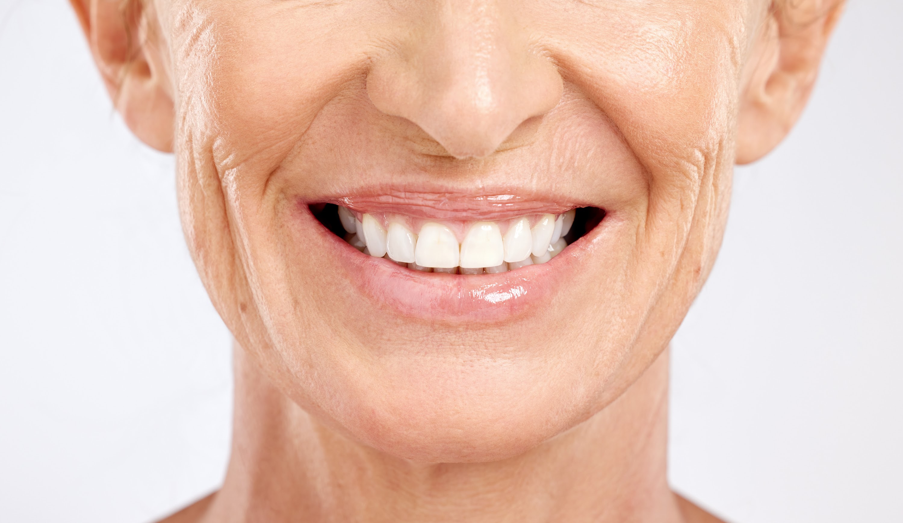 teeth-mouth-and-smile-of-a-senior-woman-with-dent-2023-11-27-05-36-10-utc.jpg