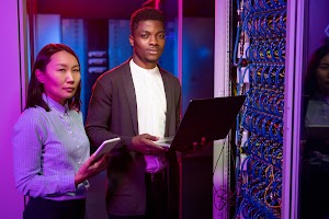 multi-ethnic-it-engineers-with-gadgets-in-server-r-2023-11-27-05-27-50-utc.JPG