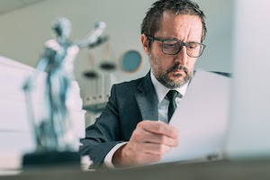 lawyer-reading-legal-contract-agreement-in-law-pra-2024-12-06-02-59-13-utc.jpg