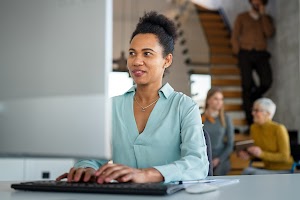 manager-woman-sitting-at-a-desk-in-creative-office-2025-01-08-18-20-44-utc.jpg