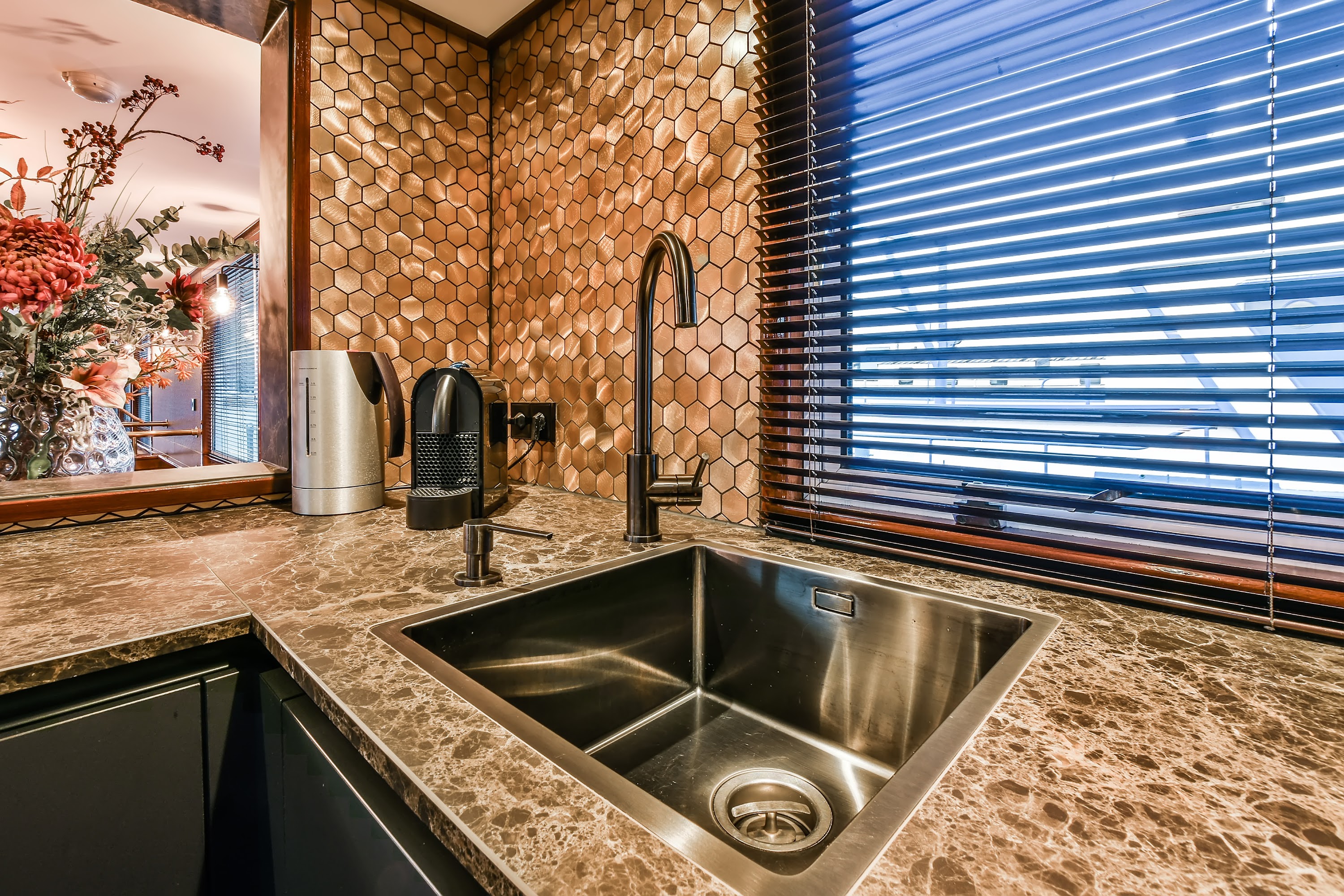 metal-sink-on-kitchen-counter-2023-11-27-05-14-29-utc.jpg