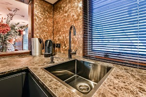 metal-sink-on-kitchen-counter-2023-11-27-05-14-29-utc.jpg