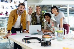 portrait-of-diverse-business-people-discussing-ove-2023-11-27-04-57-46-utc.jpg